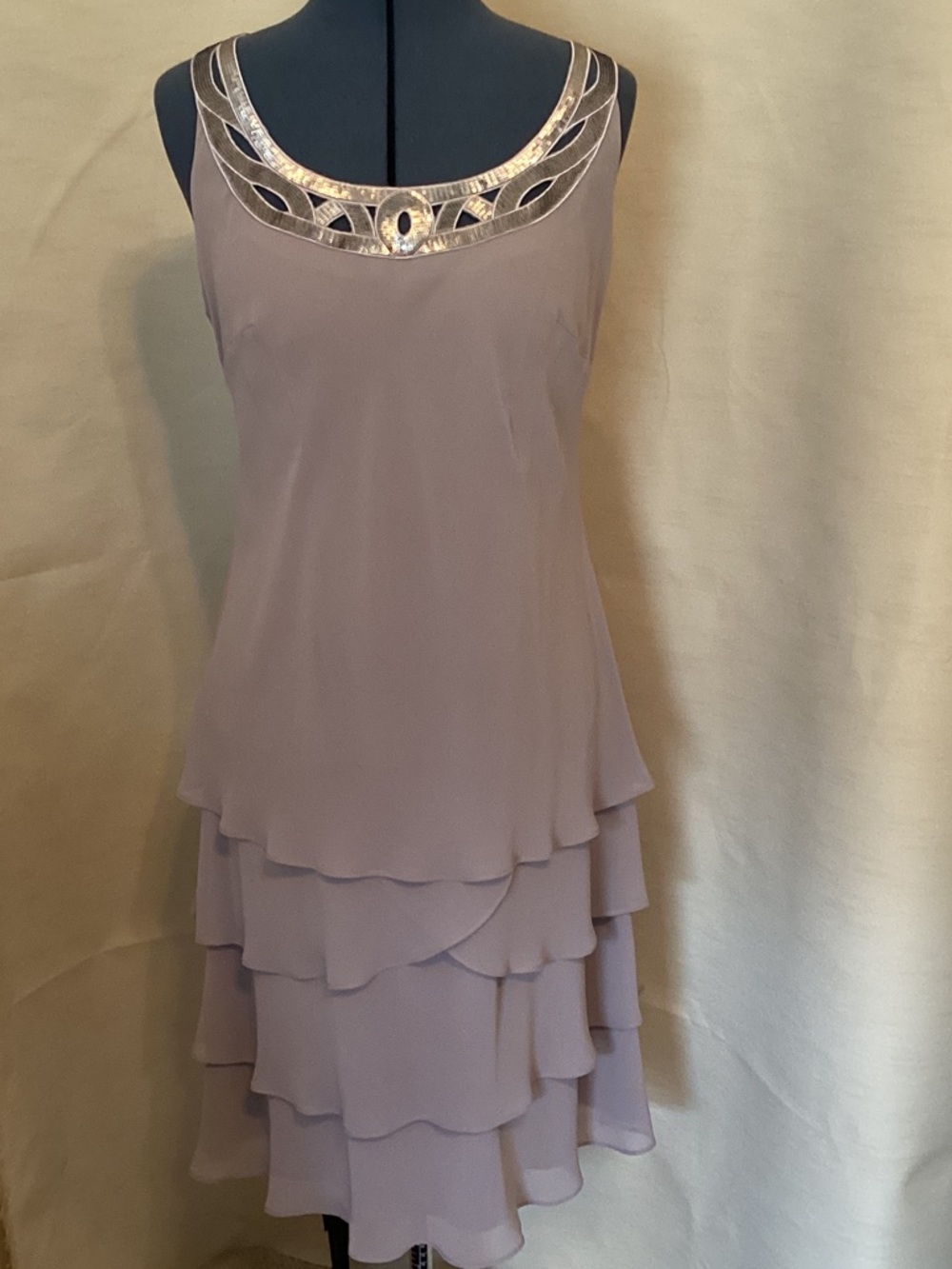 Sleeveless Tiered Midi Dress with Decorative Neckline